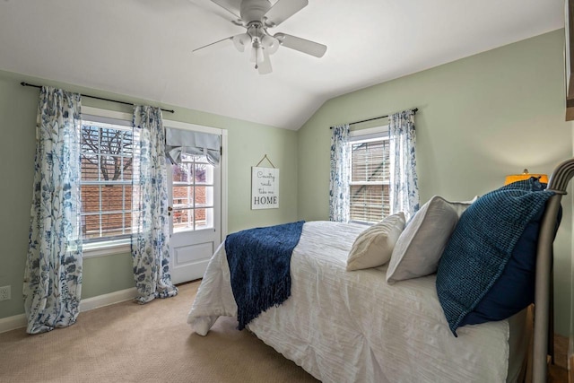 bedroom with baseboards, carpet, ceiling fan, and vaulted ceiling