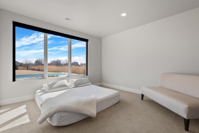 carpeted bedroom with visible vents, recessed lighting, and baseboards