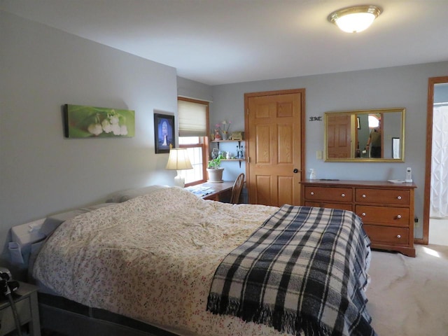 bedroom with light carpet