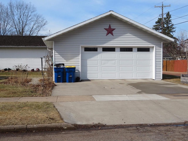 garage with fence