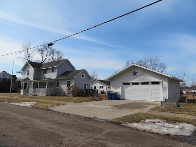 view of front facade with a porch and driveway