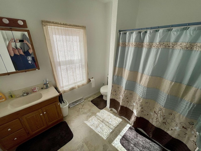 bathroom with tile patterned flooring, visible vents, toilet, a shower with curtain, and vanity