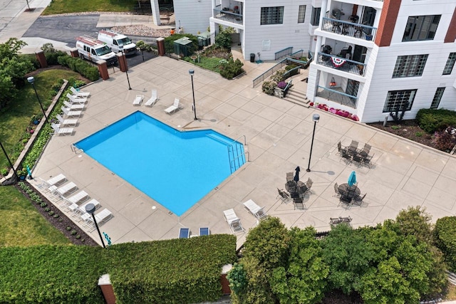 view of swimming pool with a patio area