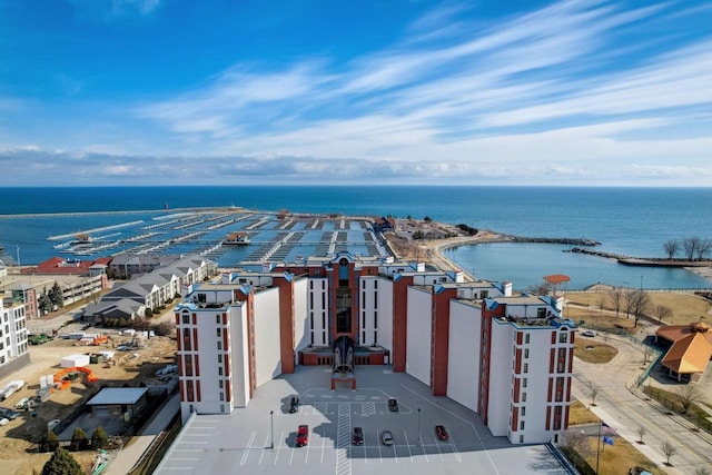 birds eye view of property featuring a water view