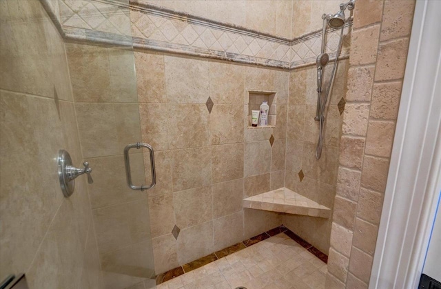 bathroom featuring a shower stall