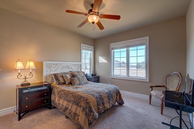 bedroom featuring light carpet, visible vents, ceiling fan, and baseboards