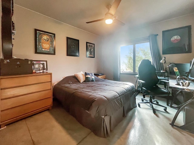 bedroom featuring wood finished floors and a ceiling fan