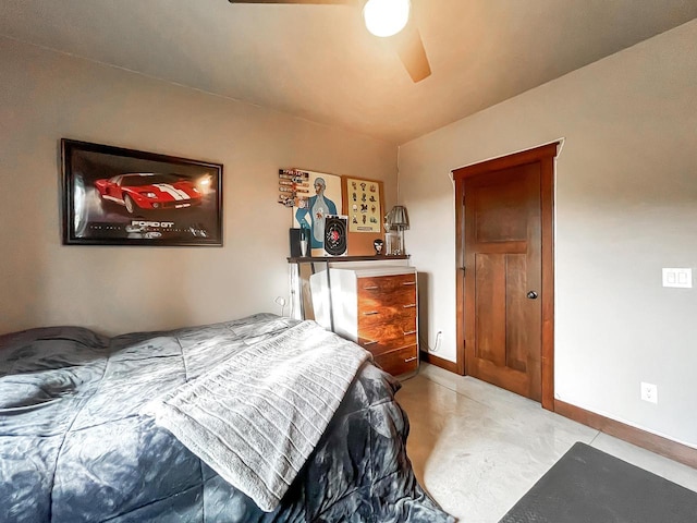 bedroom featuring a ceiling fan and baseboards