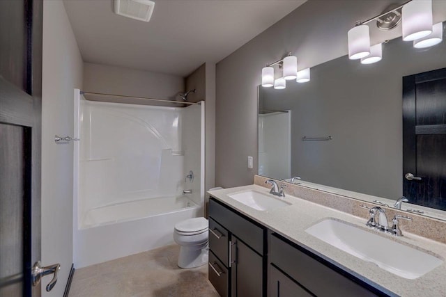 bathroom with a sink, visible vents, toilet, and washtub / shower combination