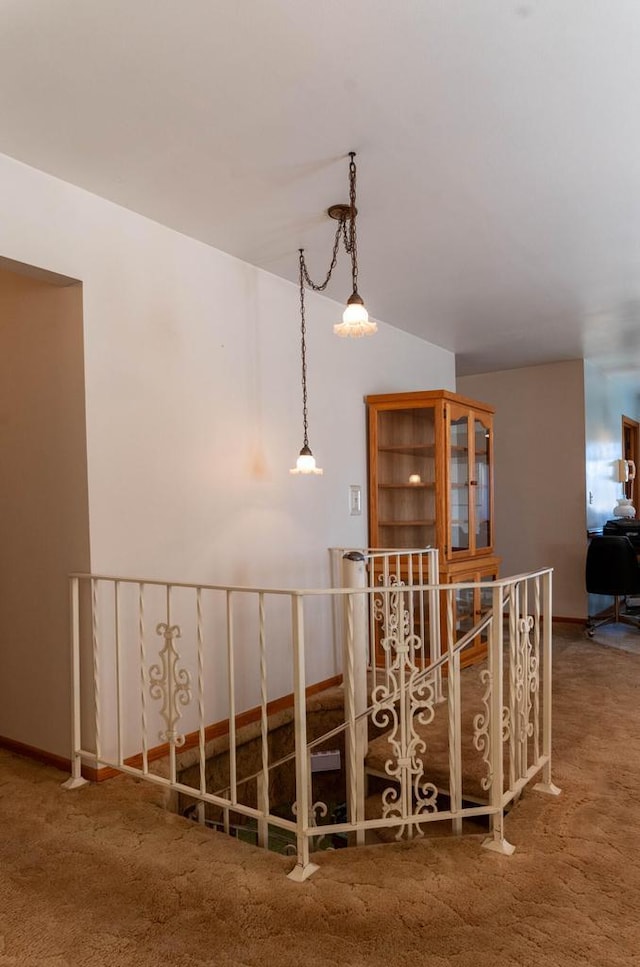 stairs with carpet flooring and vaulted ceiling