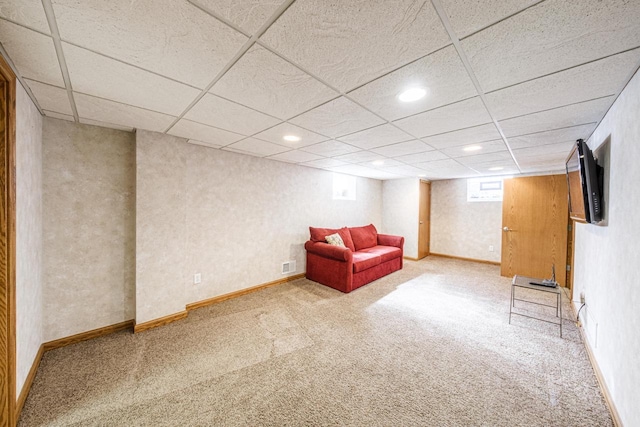 unfurnished room with recessed lighting, carpet, baseboards, and a paneled ceiling