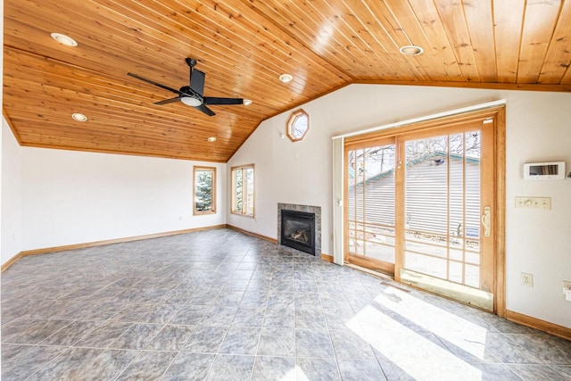 unfurnished living room with lofted ceiling, a fireplace, baseboards, wood ceiling, and ceiling fan