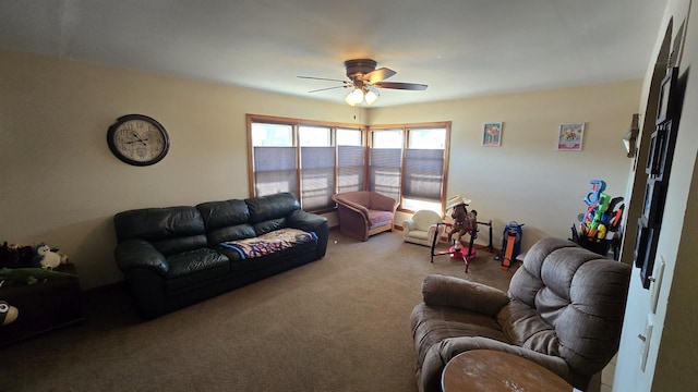 living area featuring carpet and a ceiling fan