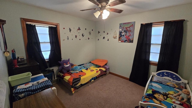 bedroom featuring carpet, baseboards, and ceiling fan