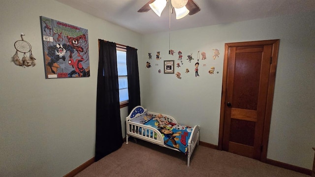 bedroom with baseboards, ceiling fan, and carpet flooring