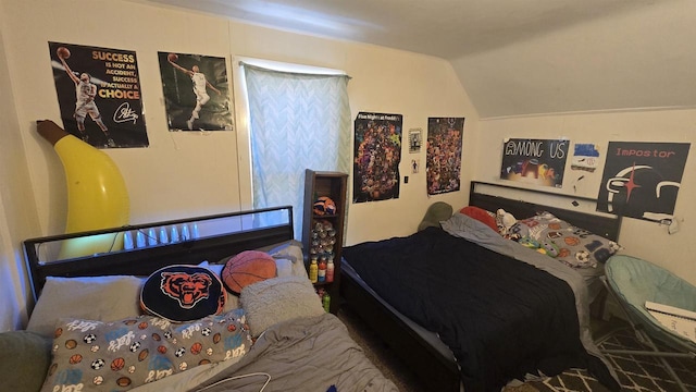 bedroom with vaulted ceiling