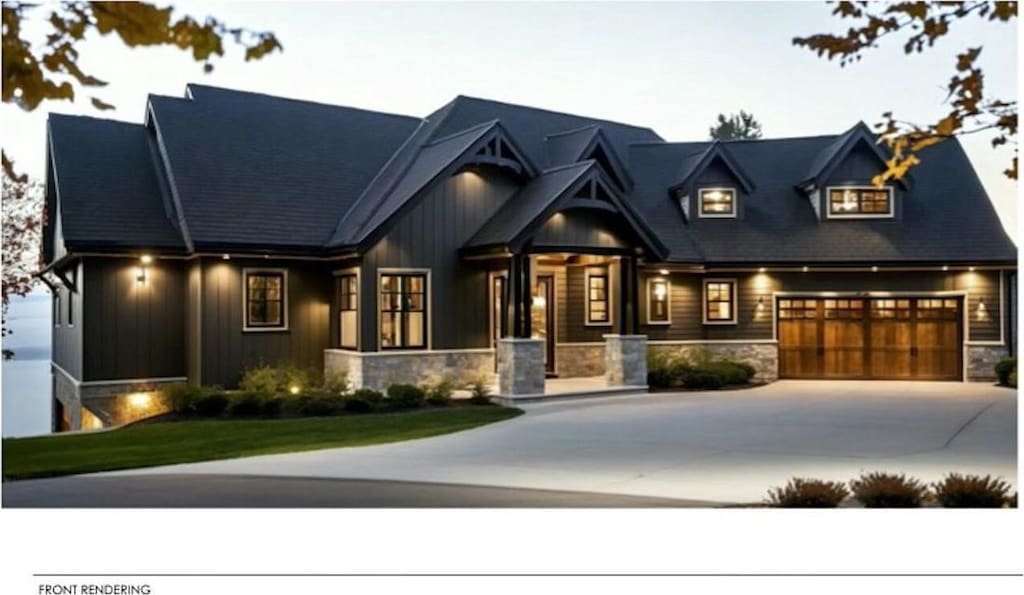 view of front of house with board and batten siding, concrete driveway, an attached garage, and stone siding