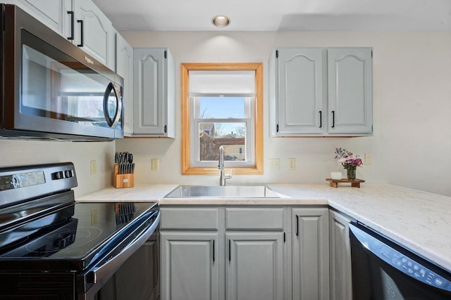 kitchen with a sink, stainless steel appliances, and wine cooler