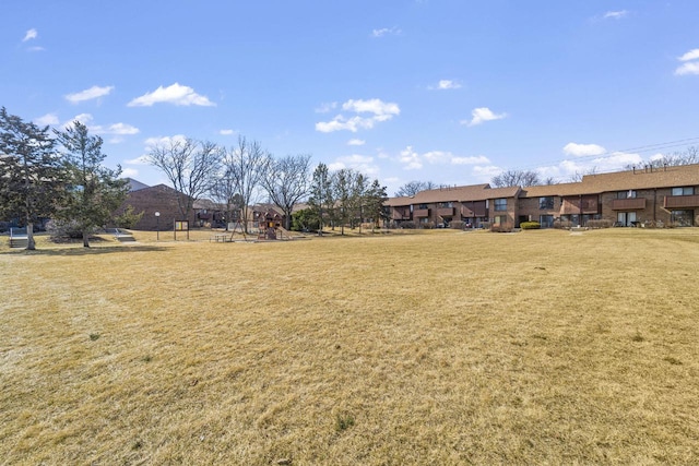 view of yard featuring playground community