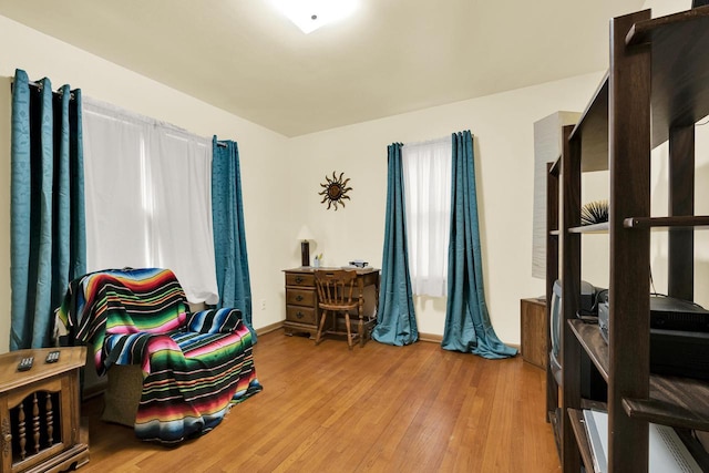 sitting room with wood finished floors