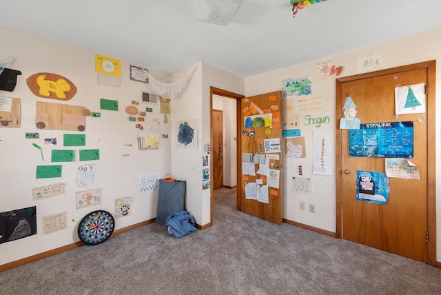 bedroom featuring visible vents, baseboards, and carpet flooring