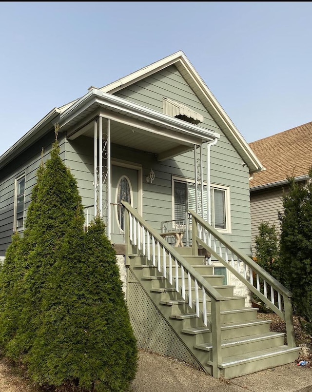 view of front of house with stairway