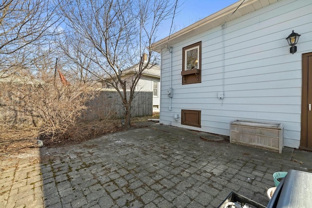 view of patio with fence