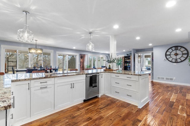 kitchen featuring light stone countertops, visible vents, recessed lighting, dark wood-type flooring, and white cabinetry