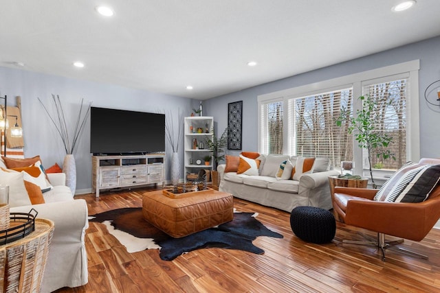 living room featuring recessed lighting and wood finished floors