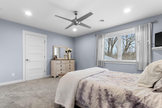 carpeted bedroom with recessed lighting, visible vents, baseboards, and a ceiling fan