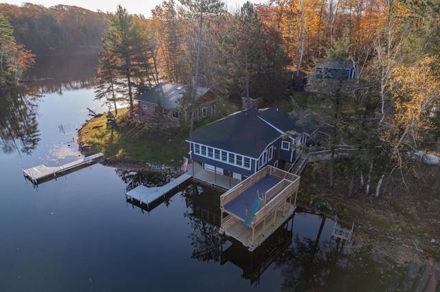 aerial view with a view of trees and a water view