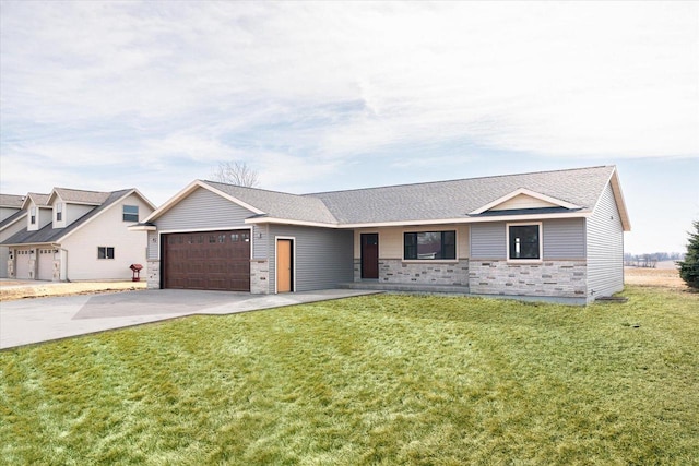 view of front of home with driveway, stone siding, an attached garage, and a front yard