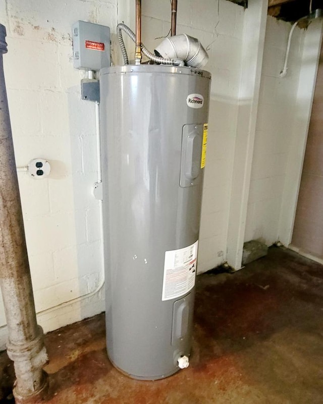 utility room with water heater