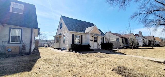 view of property exterior featuring a yard