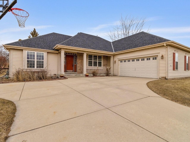 ranch-style home featuring an attached garage, covered porch, driveway, and roof with shingles