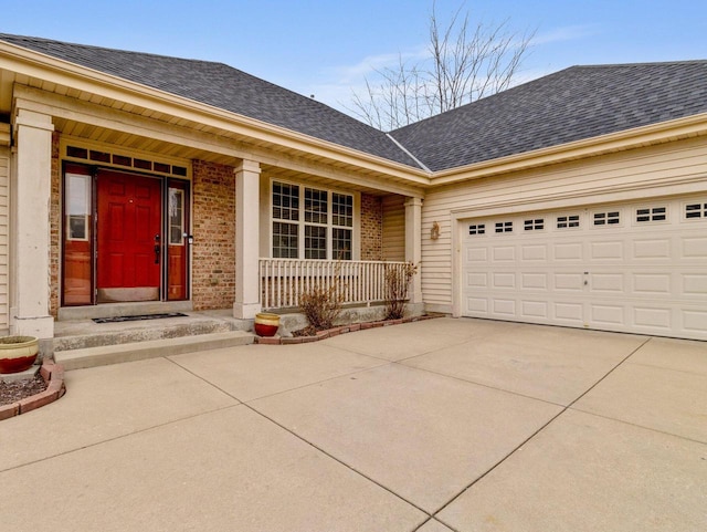 view of front of home with brick siding, concrete driveway, roof with shingles, covered porch, and a garage