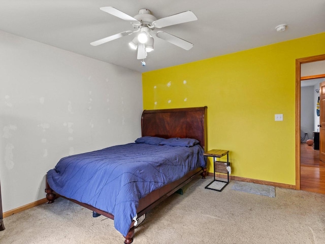 bedroom with baseboards, carpet floors, and ceiling fan