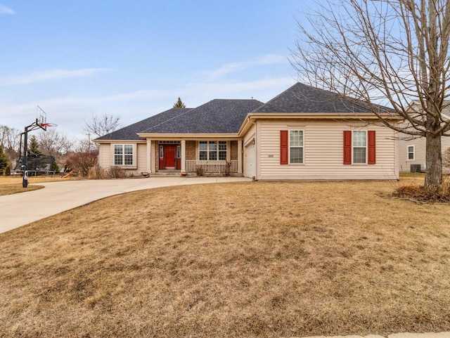 ranch-style home with a front yard, a garage, driveway, and a shingled roof