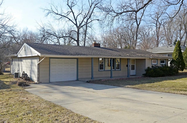5511 Maywood Rd, Monona, WI 53716 - single story home featuring driveway, a front lawn, cooling unit, a garage, and a chimney