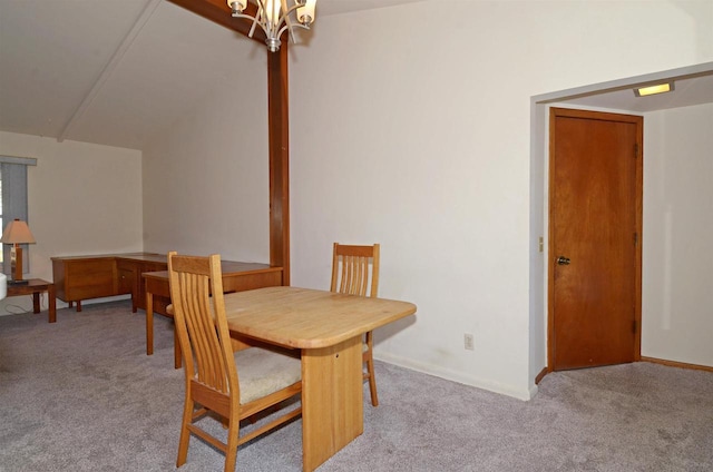 5511 Maywood Rd, Monona, WI 53716 - dining area featuring carpet, baseboards, and a chandelier