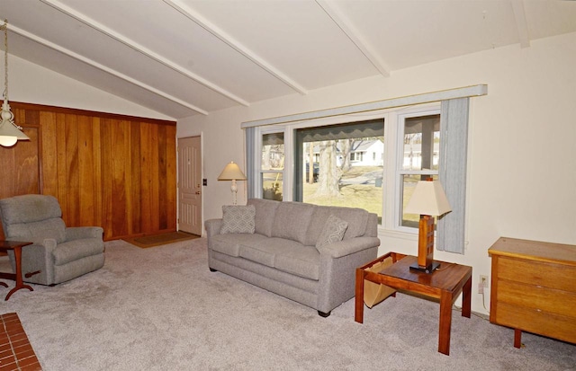 5511 Maywood Rd, Monona, WI 53716 - carpeted living area featuring vaulted ceiling with beams and wood walls