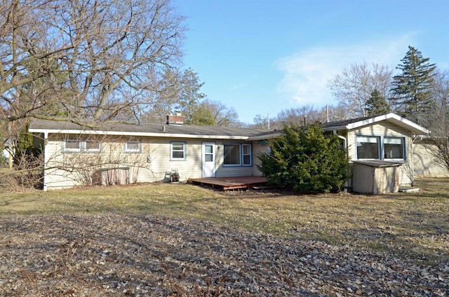 5511 Maywood Rd, Monona, WI 53716 - rear view of house featuring a wooden deck and a lawn