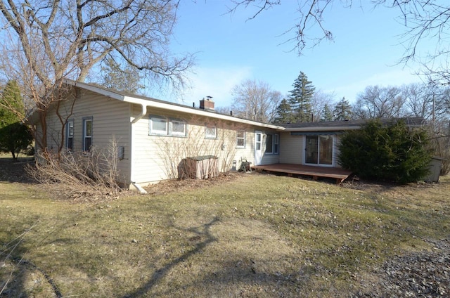 5511 Maywood Rd, Monona, WI 53716 - back of house with a wooden deck and a chimney