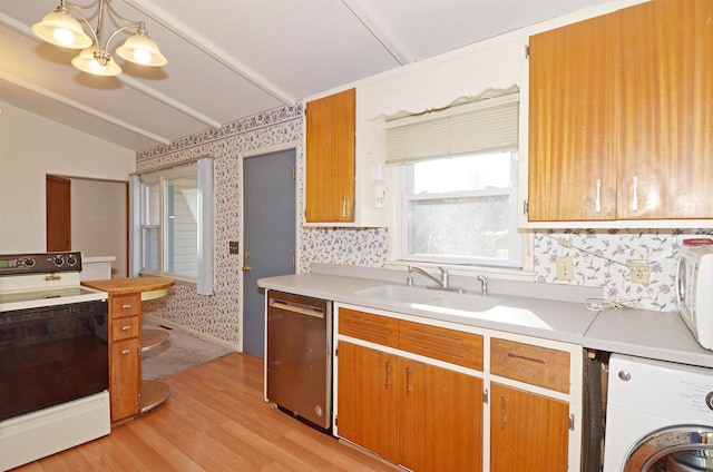 5511 Maywood Rd, Monona, WI 53716 - kitchen featuring white appliances, wallpapered walls, washer / clothes dryer, a sink, and light countertops