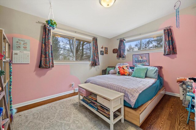 3103 W Riverland Dr, Mequon, WI 53092 - bedroom with baseboards, lofted ceiling, and wood finished floors