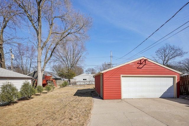 detached garage with fence