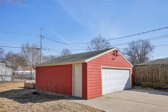 detached garage with fence