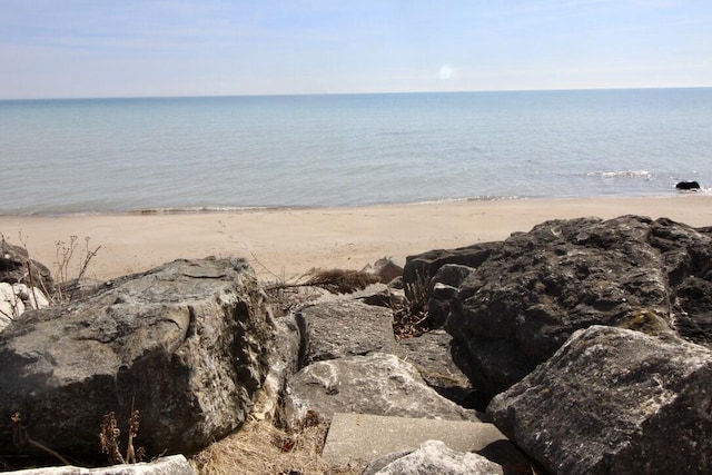 property view of water with a beach view