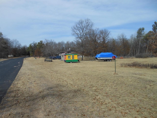 392/394 Woodbridge Way, Nekoosa, WI 54457 - surrounding community with a lawn