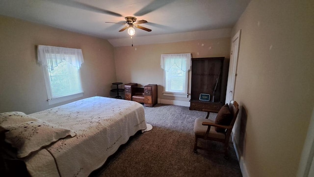 bedroom featuring carpet flooring, a ceiling fan, and vaulted ceiling